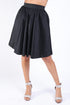Black pleated midi flare skirt by Puce Juniper featuring a high waist and casual elastic waistband.