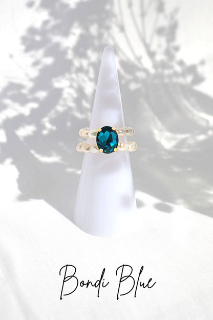 Ultramarine Birch 3 shades blue CZ freshwater pearl rings, featuring elegant design with sparkling stones and classic pearl accents.