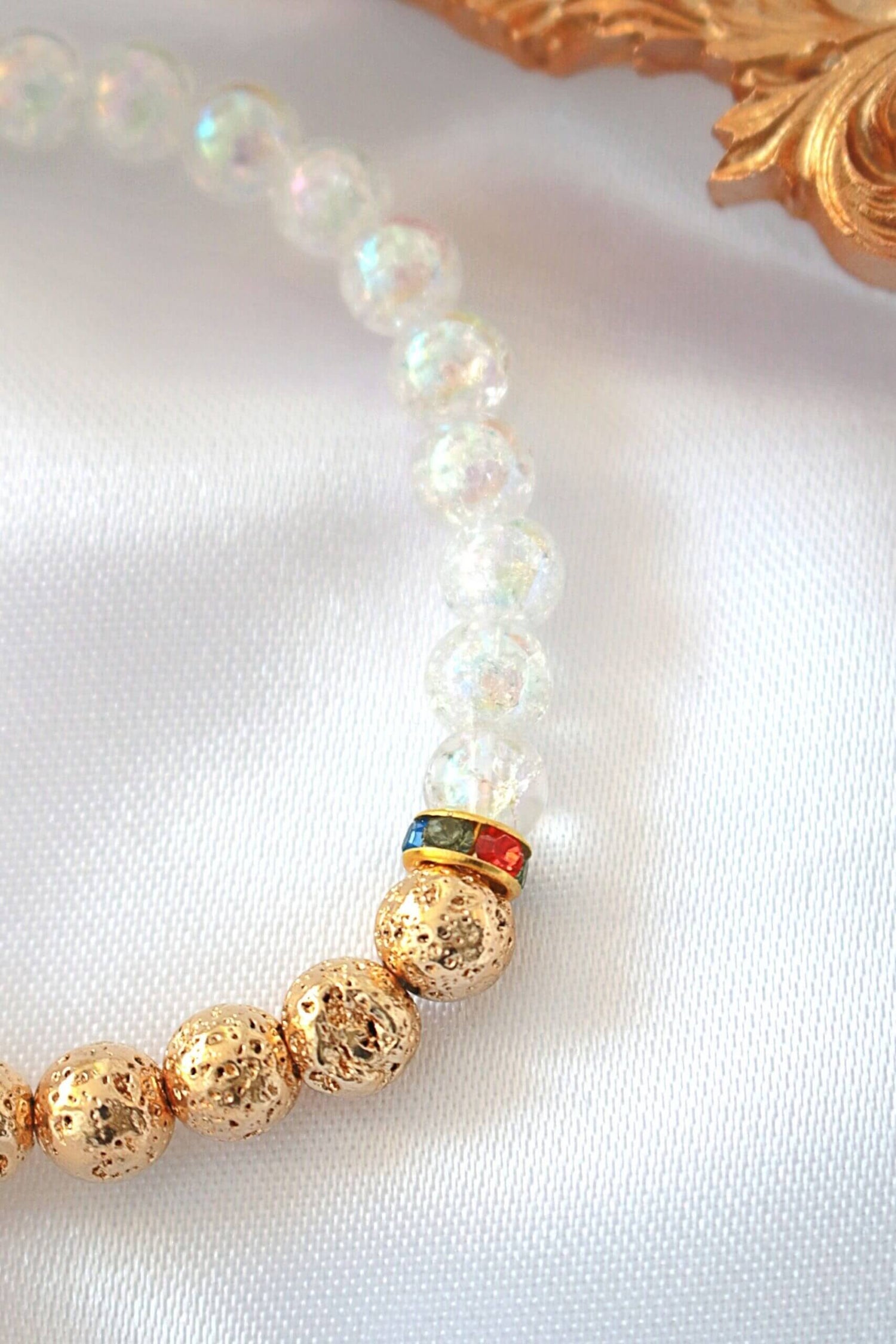 Golden Lava Stone elastic bracelet from Ultramarine Birch featuring an aroma diffuser bracelet design with natural lava stones.