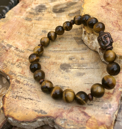 Violet Chaos Tiger Eye and Buddha gemstone bracelet featuring natural polished tiger eye beads and a Buddha charm.