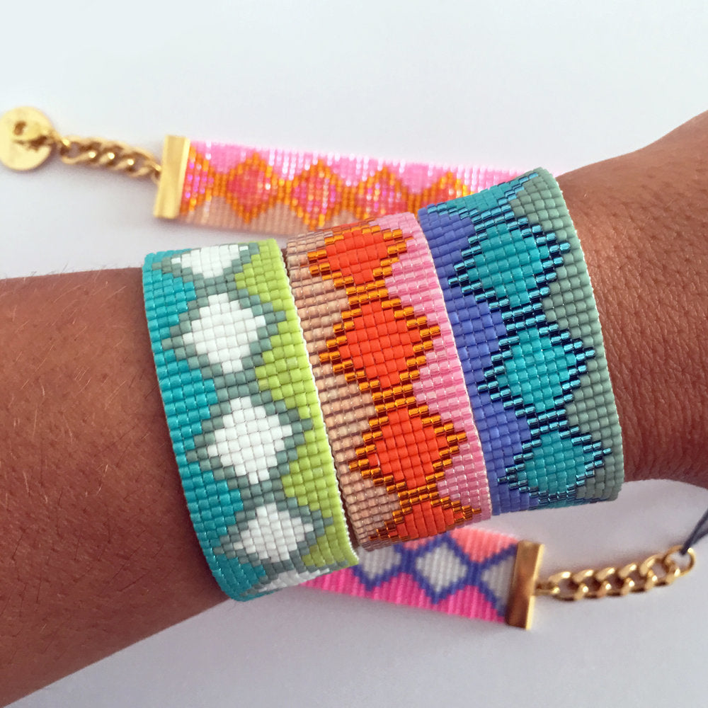 Yellow Athena Rio and Ibiza bracelets set featuring colorful beaded jewelry with adjustable clasps and vibrant designs.