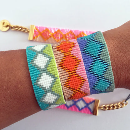 Yellow Athena Rio and Ibiza bracelets set featuring colorful beaded jewelry with adjustable clasps and vibrant designs.