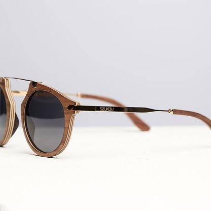 Fuchsia Artemis Santa Monica wooden sunglasses for women with round frames and natural wood finish, stylish and eco-friendly eyewear