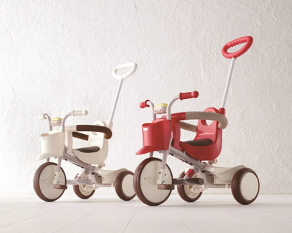 Taupe Pear evolutive tricycle for kids, featuring a sturdy frame and three wheels for stability and safe riding.