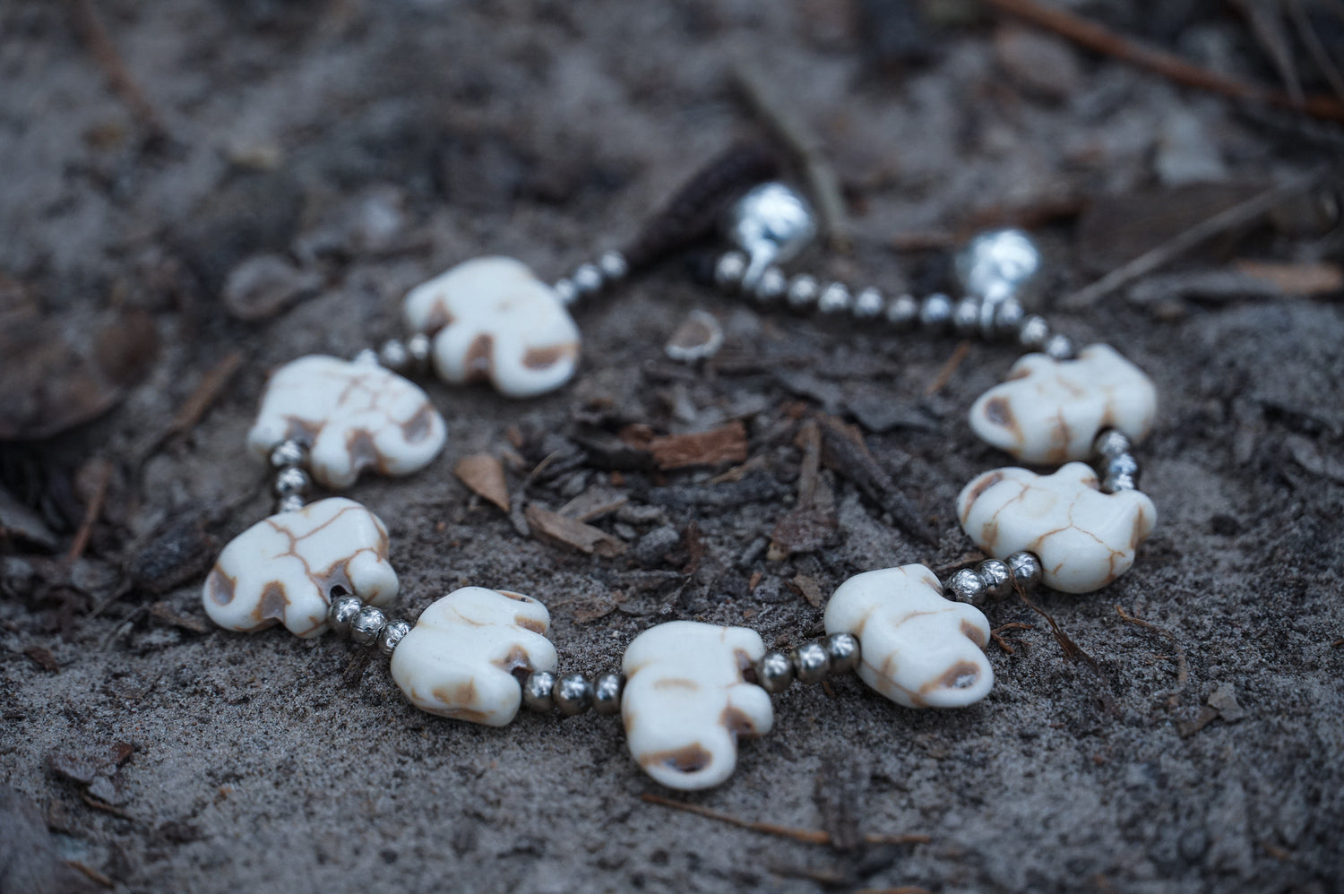 Silver Elephant Stone Bracelet by Tan Smokey featuring silver and stone beads on a stylish bracelet design.