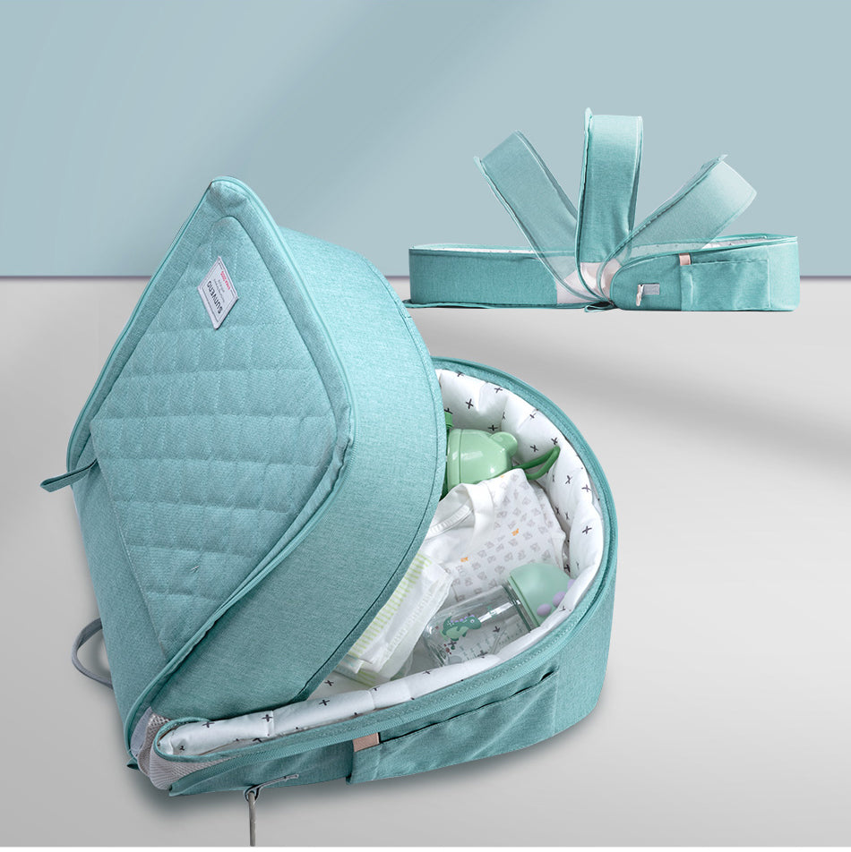 Maroon Chronos portable baby diaper bag backpack with changing pad, designed for travel and convenient diaper storage.
