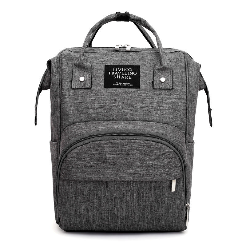 Carmine Juneberry AllFashion ActiveMom Urban Diaper Backpack with anti-theft design, showing multiple compartments and padded straps.