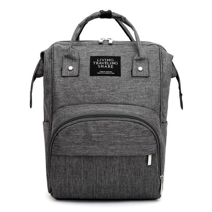 Carmine Juneberry AllFashion ActiveMom Urban Diaper Backpack with anti-theft design, showing multiple compartments and padded straps.
