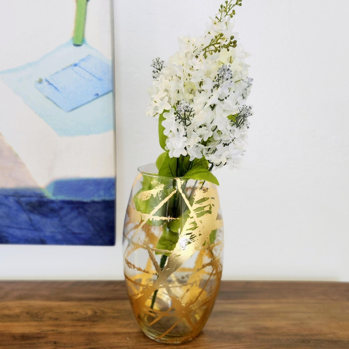 White Zeus Amaryllis 12-inch gold gilded glass bullet vase, elegant home decor piece with a sleek, modern design.