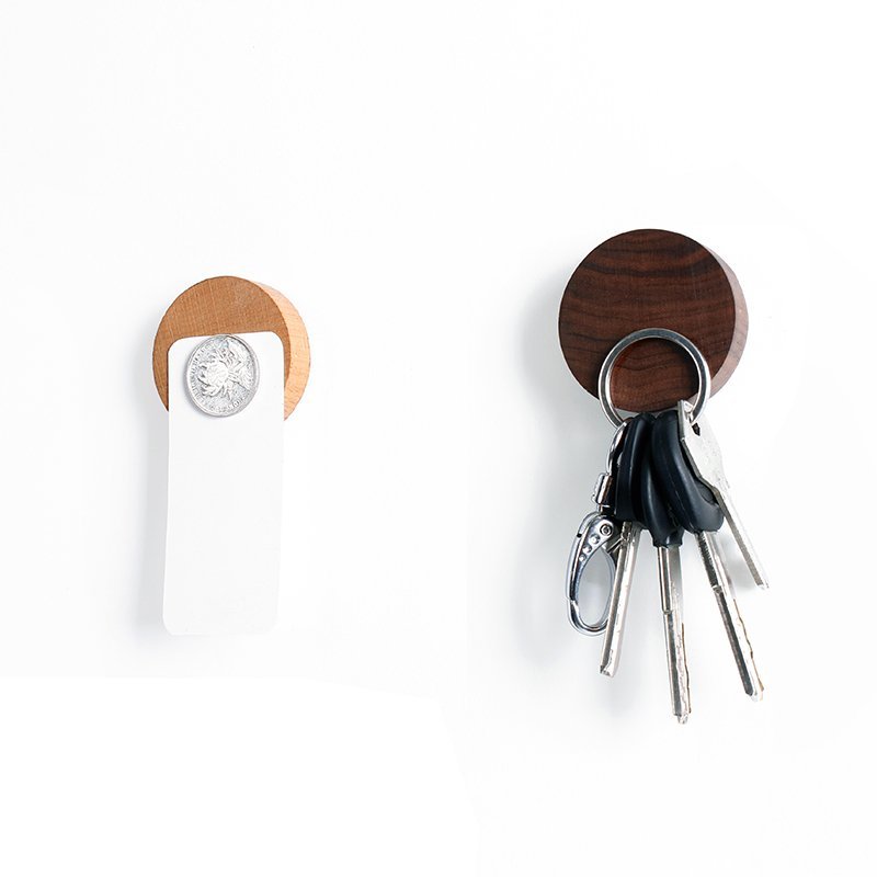 Fuchsia Molly wooden magnet key holder with hooks, mounted on a wall for organizing keys and small accessories in home and garden.