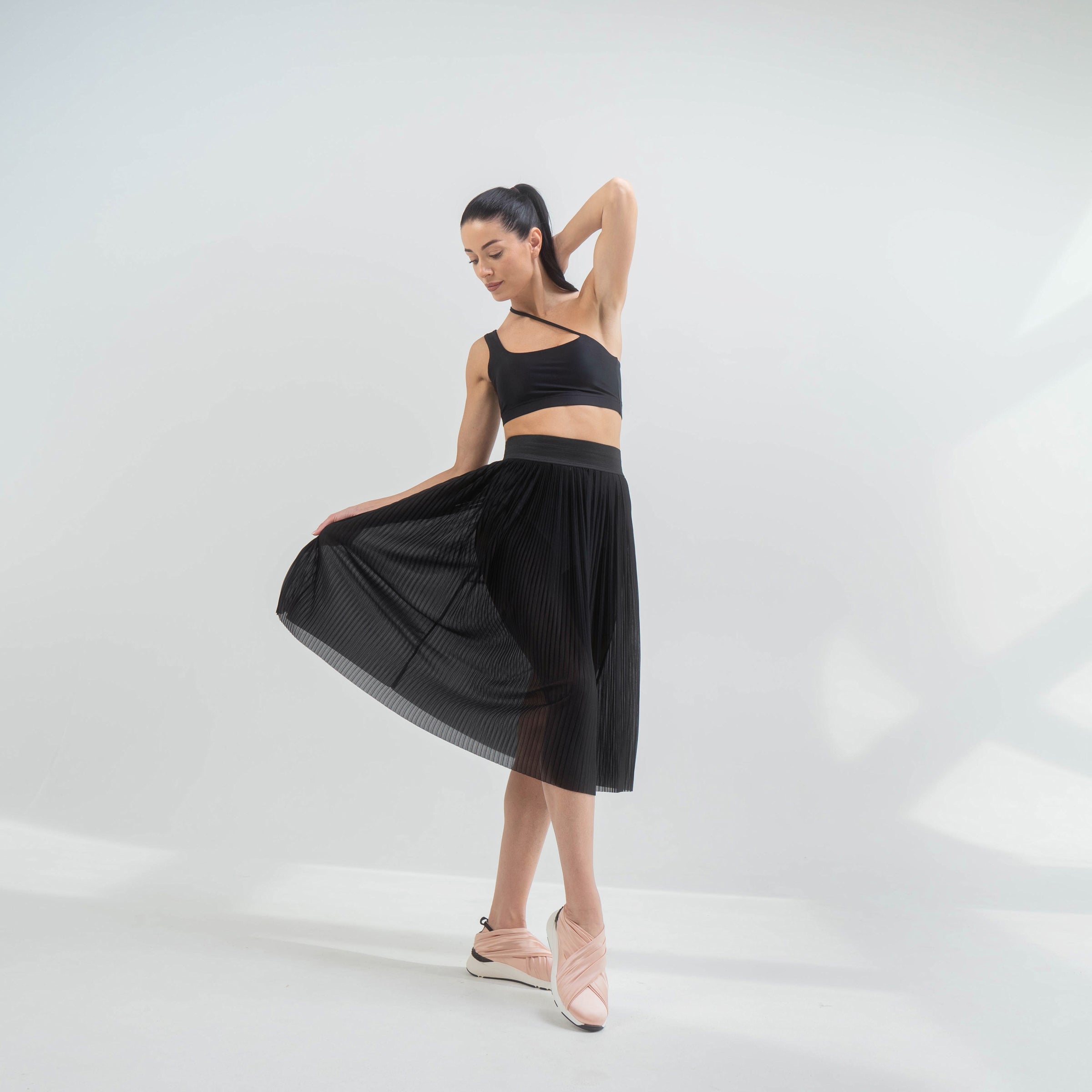 Indigo Thalassa Pleasy mesh skirt featuring a lightweight, semi-sheer fabric with a flowy design and elastic waistband.
