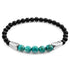 Blue turquoise Hukou silver and stone bracelet by Magenta Sooty featuring intricate silverwork and vibrant turquoise stones.