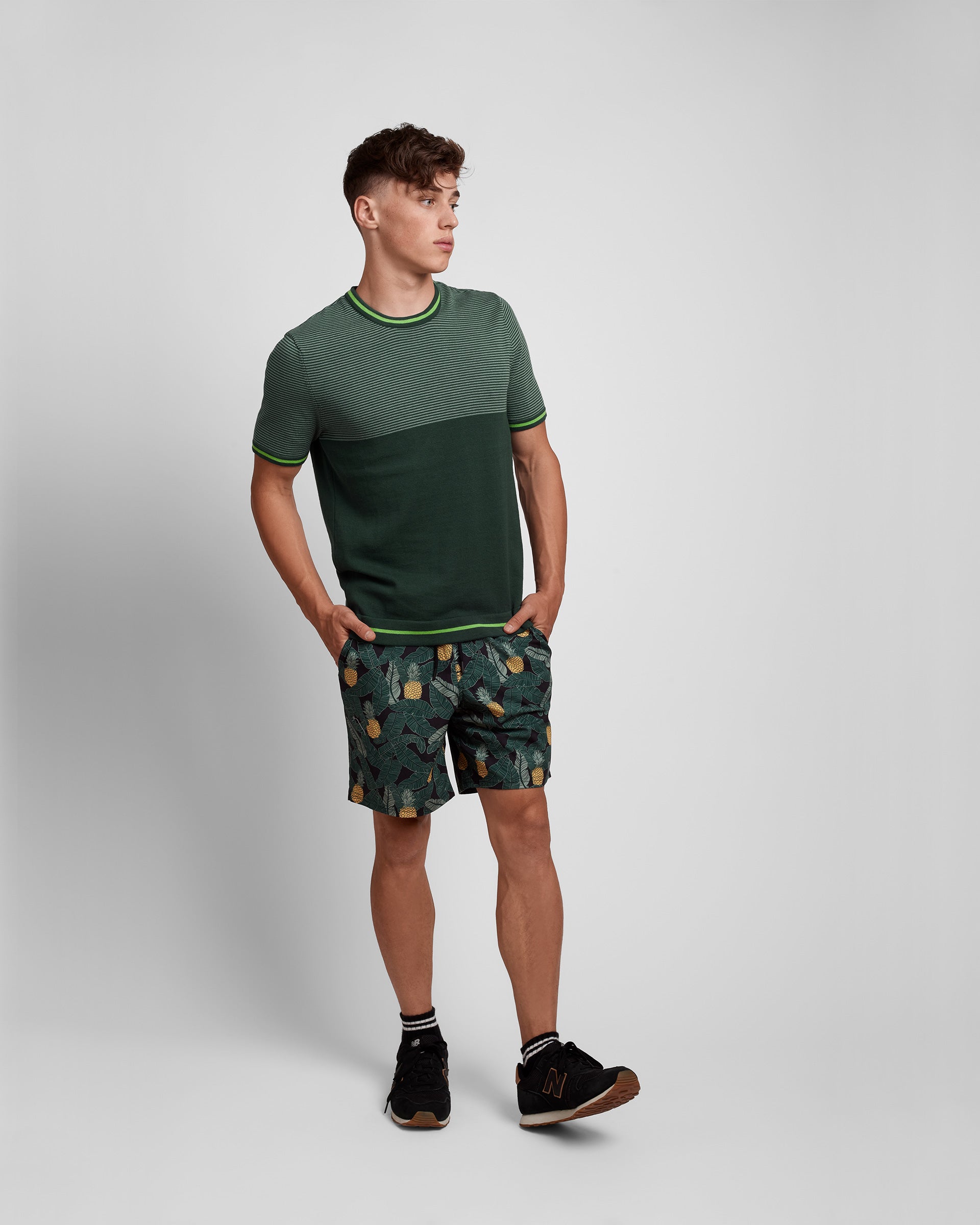 Violet Castor crew neck multicolored short sleeve knit-tee with top stripe pattern, showcasing vibrant colors and casual style.