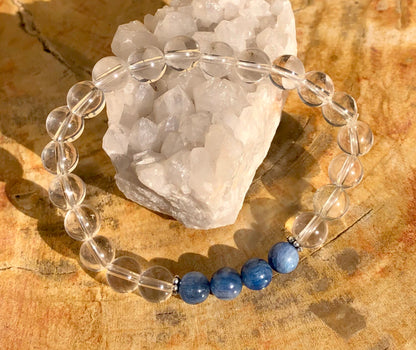Blue Kyanite and crystal quartz stretch bracelet featuring genuine stones from Violet Chaos, displayed on a neutral background.