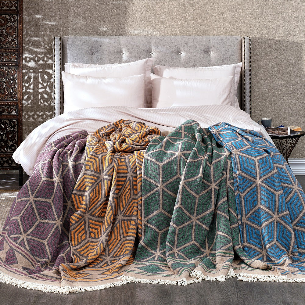 Olive Rose Ela Soft Jacquard Cotton Bedspread displayed on a bed with intricate patterns and soft texture.