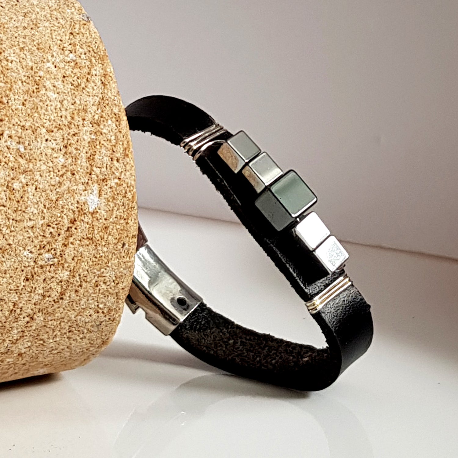 Large black leather and hematite band bracelet by Maroon Smudge featuring a sleek, durable design perfect for stylish accessories.
