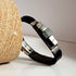 Large black leather and hematite band bracelet by Maroon Smudge featuring a sleek, durable design perfect for stylish accessories.