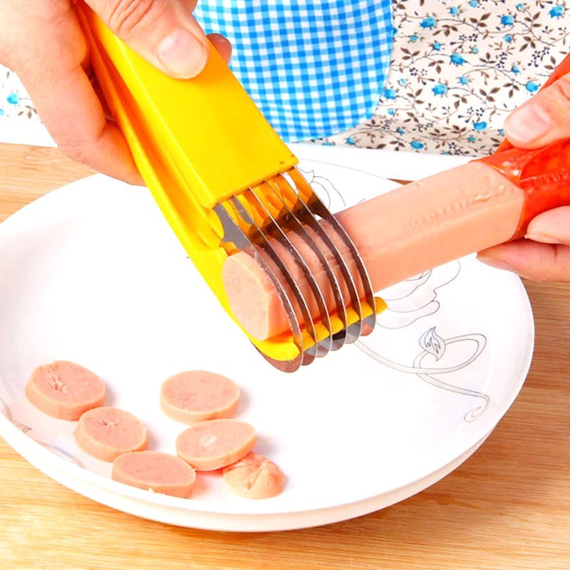 Fuchsia Molly Banana Ham Slicer in a home kitchen, showing its stainless steel blade and ergonomic handle for precise slicing.