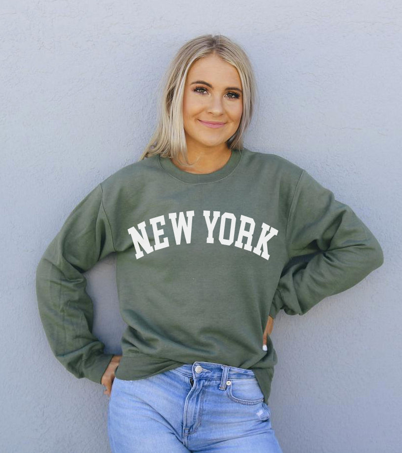 Agate New York sweatshirt showing a cozy, casual sweater with a printed New York graphic on the front, perfect for streetwear style.