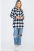Lime Milo oversized boyfriend plaid checkered flannel top with a relaxed fit and button-front design, shown on a model.