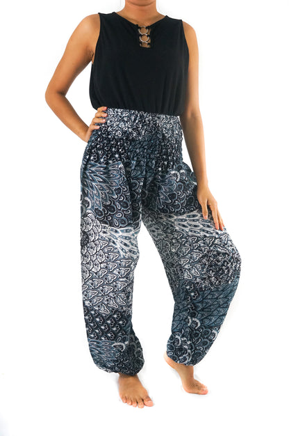 Black peacock print boho pants for women by Tan Smokey, featuring hippie style and comfortable yoga-inspired design.
