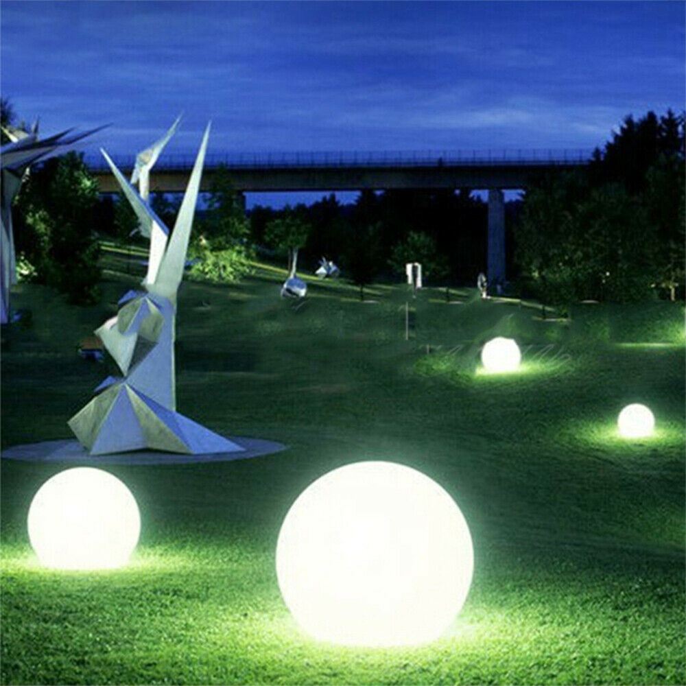 RGB color-changing LED floating pool lights by Lilac Milo, spherical waterproof lighting for outdoor pools.