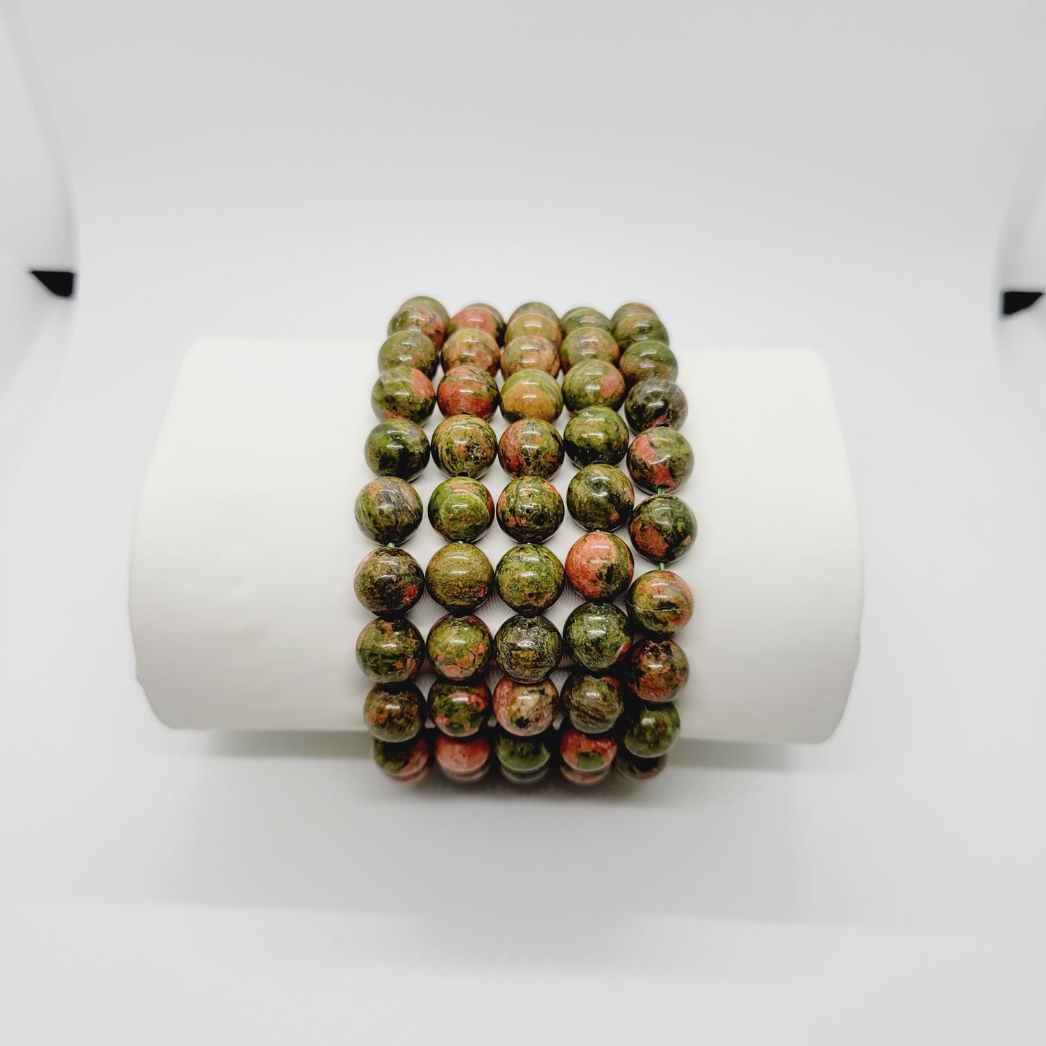 Unikite Jasper stone bracelet by Olive Coeus featuring natural beads with earthy tones, ideal for metaphysical and Reiki practices.