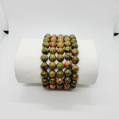 Unikite Jasper stone bracelet by Olive Coeus featuring natural beads with earthy tones, ideal for metaphysical and Reiki practices.
