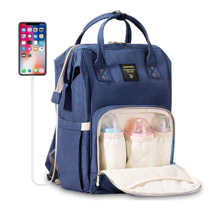 Maroon Chronos fish-opening diaper bag unicorn backpack with colorful unicorn design and multiple compartments for baby essentials.