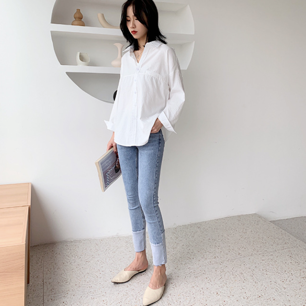 Yellow Pandora women’s relaxed fit longline shirt, lightweight blouse with a loose fit and longline design, shown on a model.