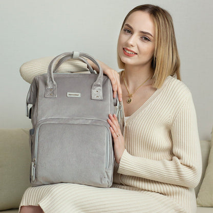 Maroon Chronos luxurious velvet diaper backpack with multiple compartments and stylish design for parenthood accessories.