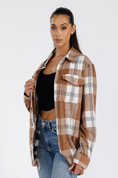 Boyfriend oversized soft flannel shacket by Lime Milo, shown in a cozy, relaxed fit with a button-up front and plaid pattern.