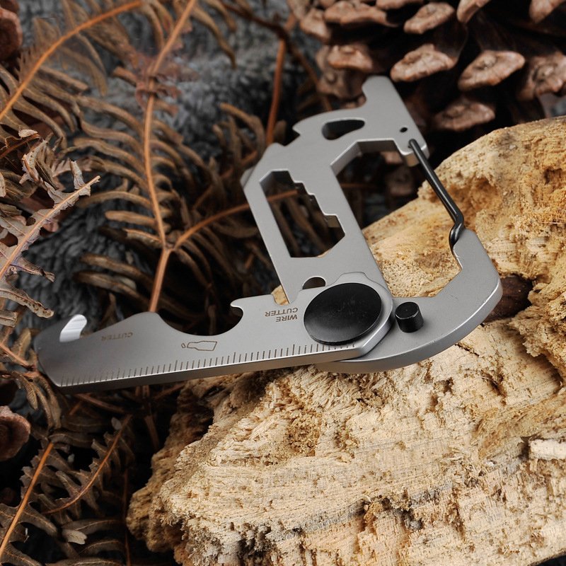 Fuchsia Molly 14-in-1 outdoor camping multi-tool with various knives, screwdrivers, and tools for outdoor adventures.