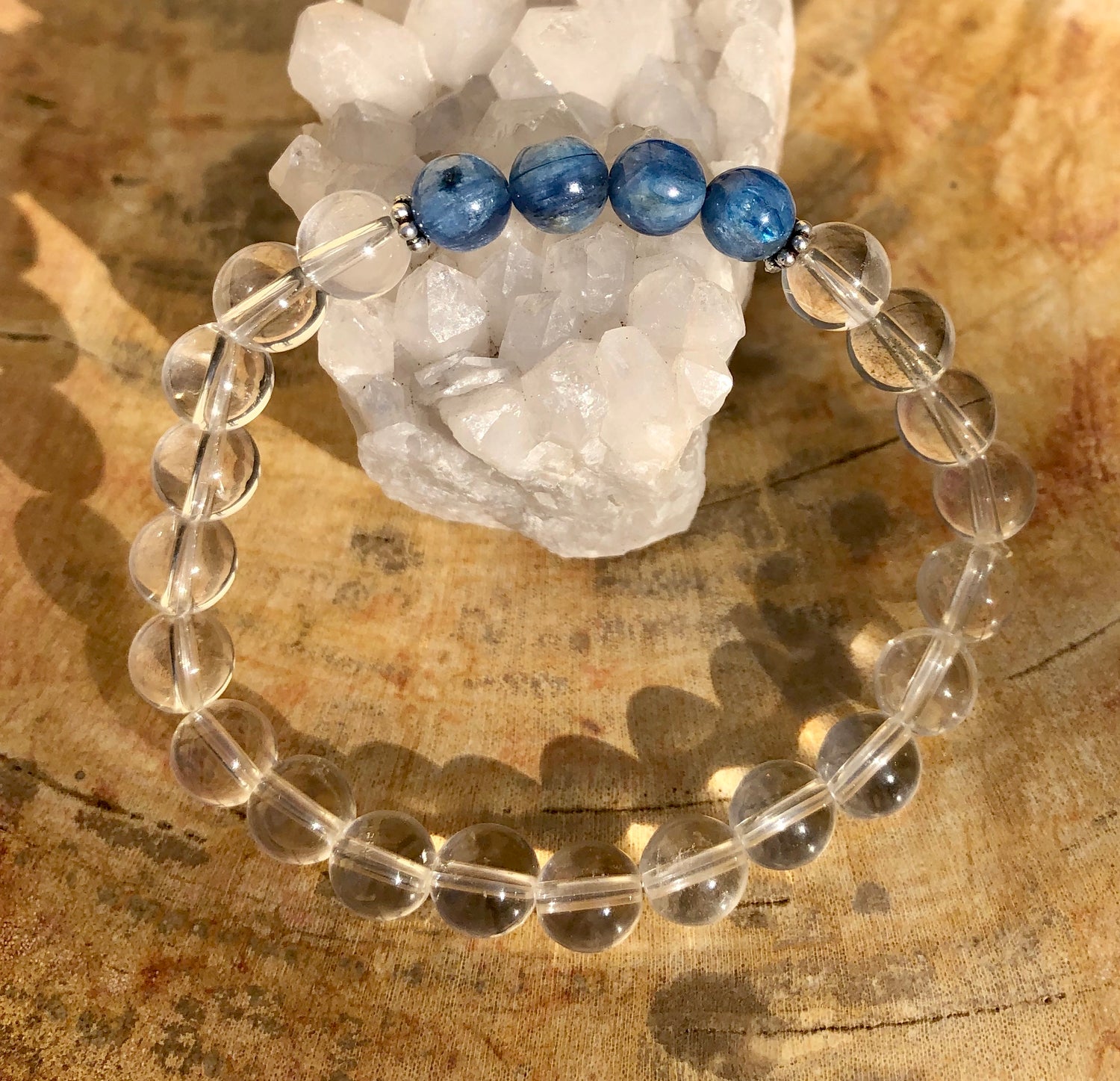 Blue Kyanite and crystal quartz stretch bracelet featuring genuine stones, designed by Violet Chaos with vibrant blue and clear beads.