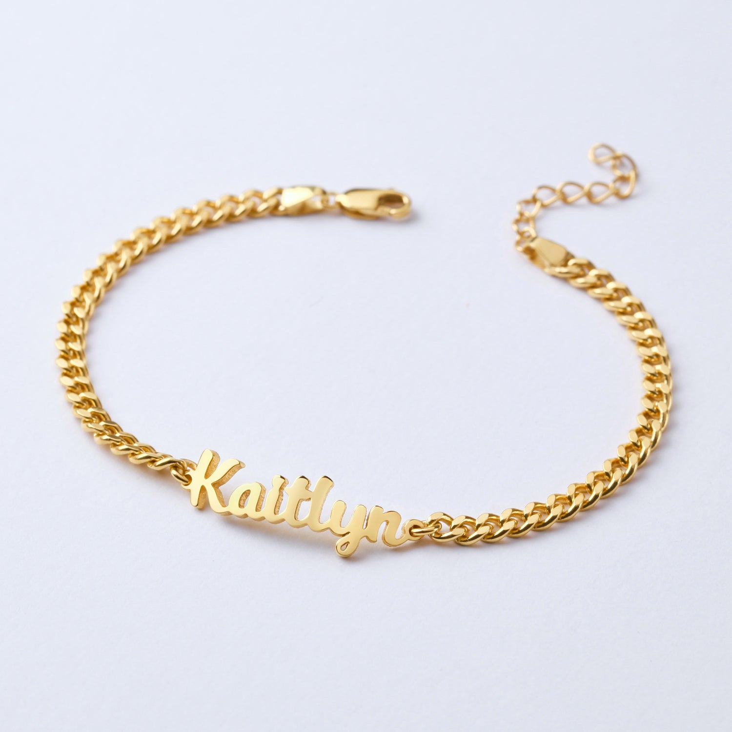 Child name bracelet by Green Millie featuring a delicate baby girl jewelry design with personalized name charm and colorful beads.