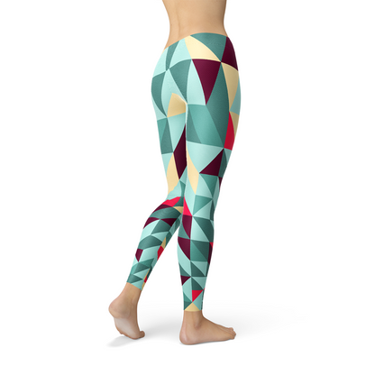 Women’s colorful geometric triangle leggings by Maroon Sooty featuring vibrant, bold pattern and comfortable fit.