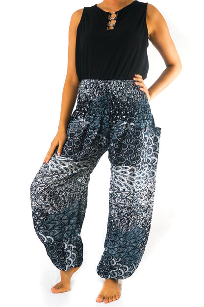 Black peacock print boho pants for women by Tan Smokey, featuring flowy hippie style perfect for yoga and casual wear.