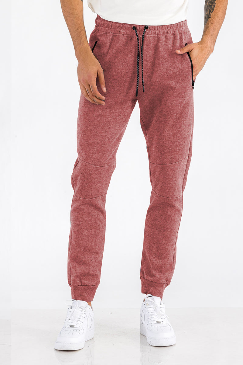 Light gray Heathered Cotton Sweats for men by Lime Milo, showing the relaxed fit and soft fabric with a drawstring waistband.