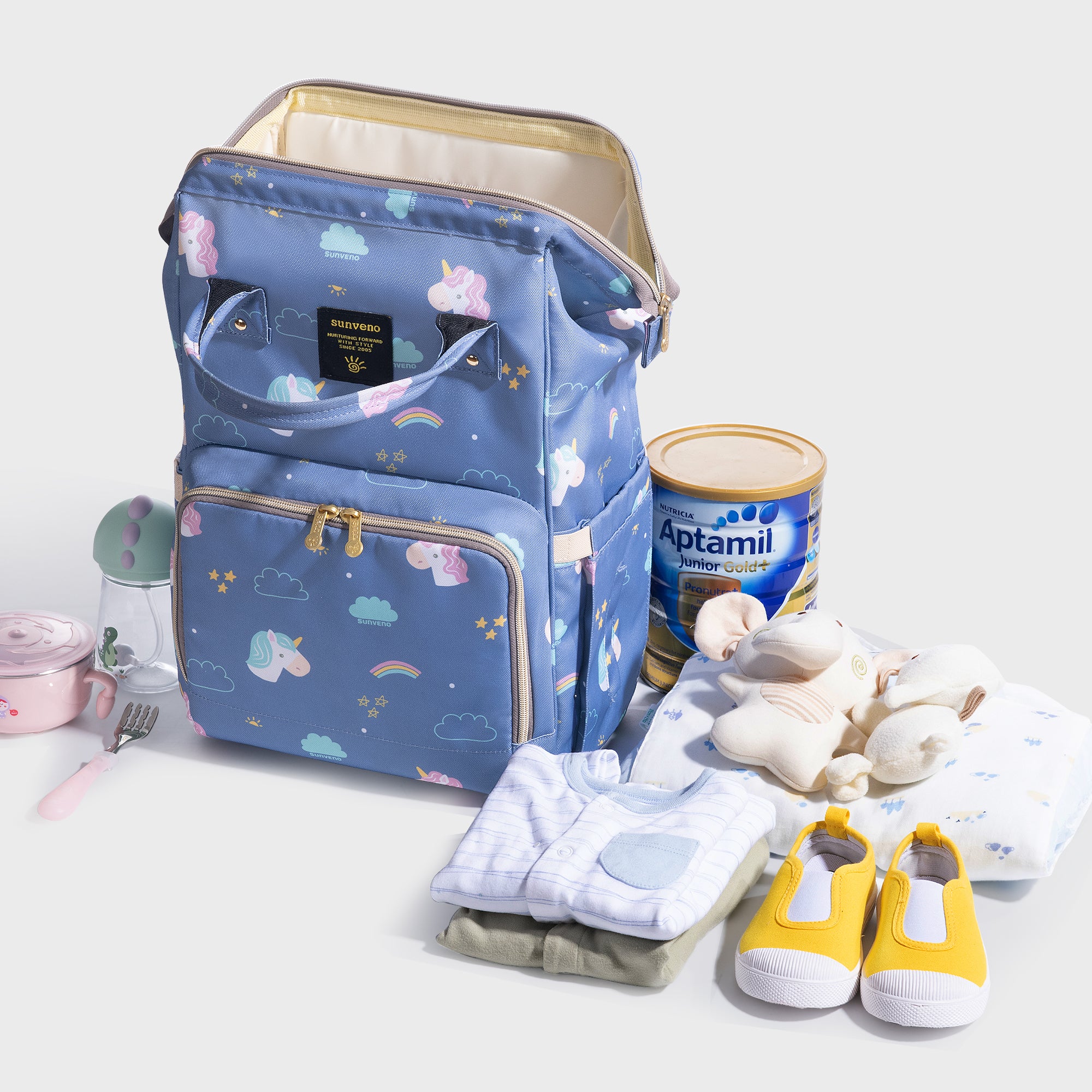 Maroon Chronos fish-opening diaper bag unicorn backpack with multiple compartments and playful unicorn design.