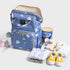 Maroon Chronos fish-opening diaper bag unicorn backpack with multiple compartments and playful unicorn design.