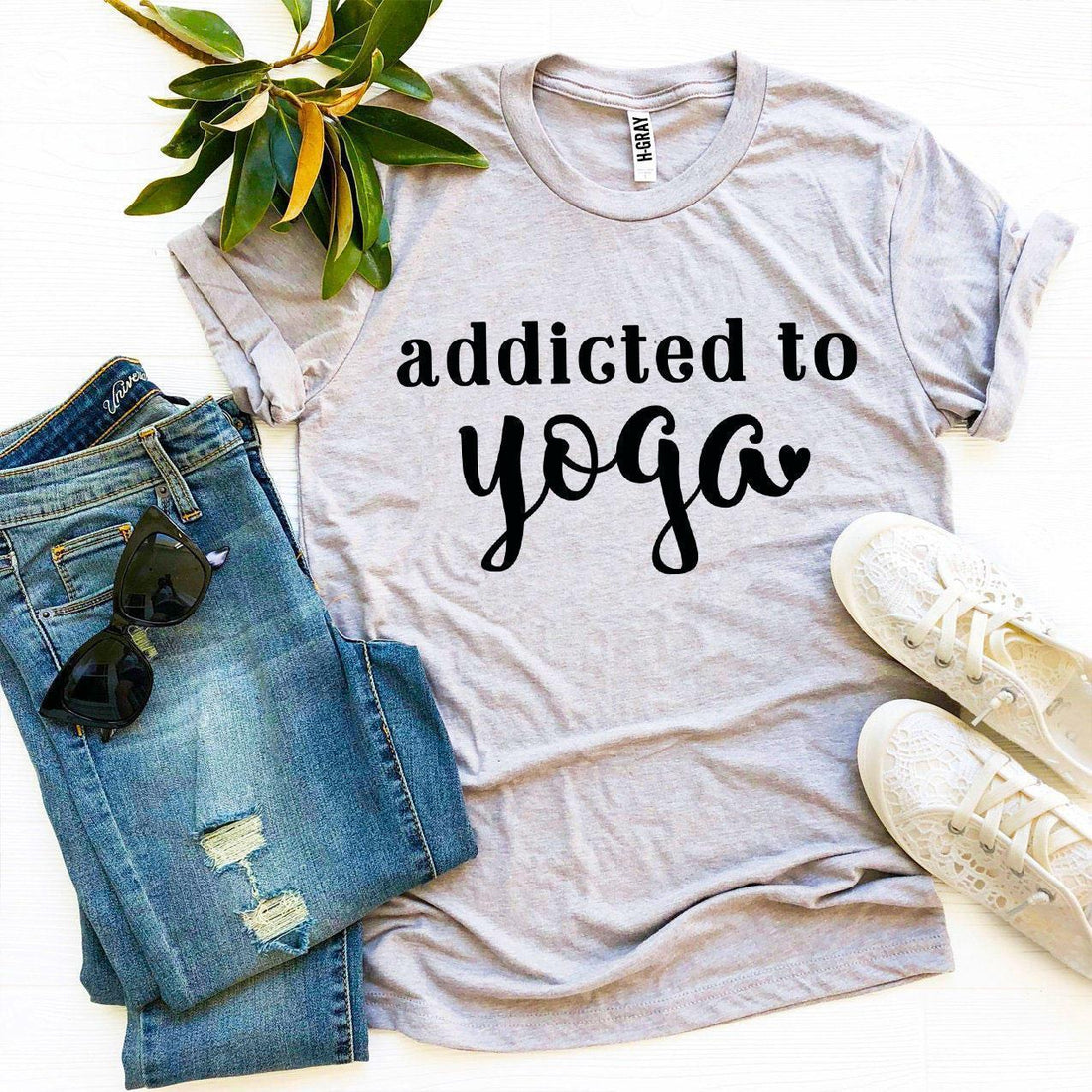 Agate Addicted To Yoga T-shirt featuring a comfortable fit and yoga-themed graphic design, ideal for casual wear.