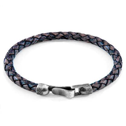 Indigo blue Skye silver and braided leather bracelet by Magenta Sooty with silver accents and woven leather design.