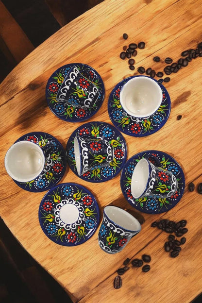Set of handmade embossed ceramic coffee mugs by Ochre Juniper, designed for Turkish coffee or espresso, with intricate patterns.