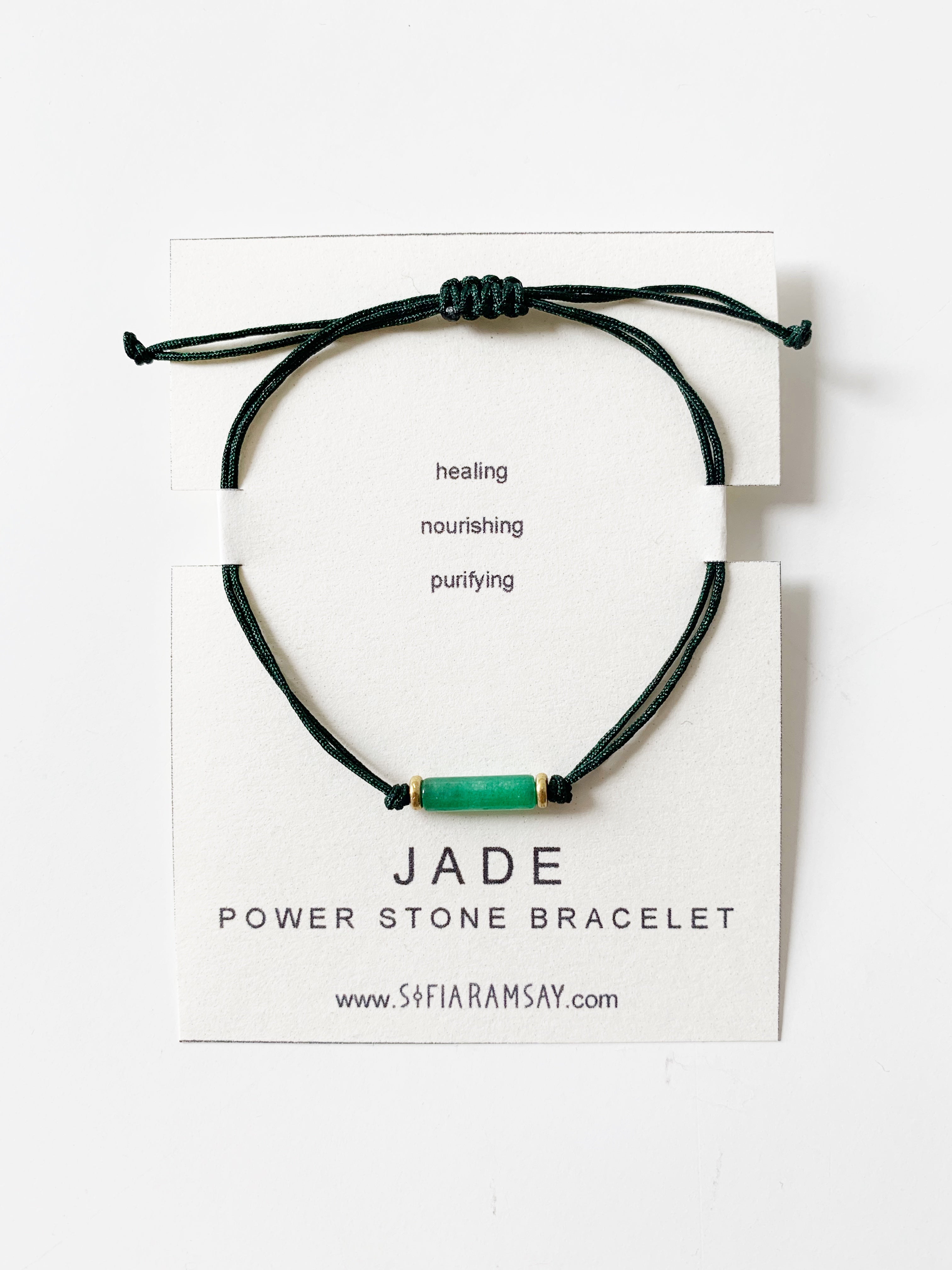 Mint Green Corydalis Jade Power Stone bracelet featuring polished green jade beads on an elastic band.