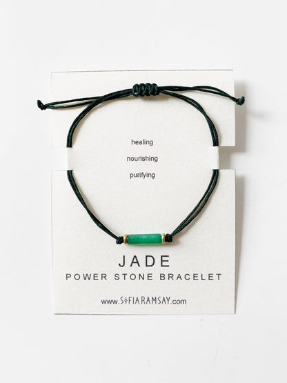 Mint Green Corydalis Jade Power Stone bracelet featuring polished green jade beads on an elastic band.