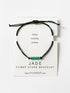 Mint Green Corydalis Jade Power Stone bracelet featuring polished green jade beads on an elastic band.