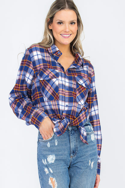 Lime Milo oversized plaid checkered flannel top with long sleeves and a relaxed fit, featuring a classic red and black pattern.