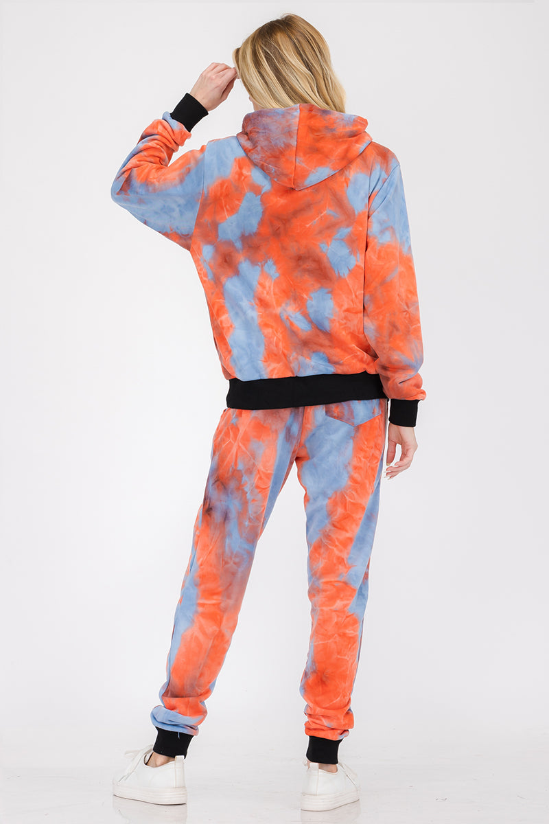 Women’s cotton tie-dye lounge wear sweat set by Lime Milo, featuring a comfortable matching top and pants in vibrant tie-dye pattern.