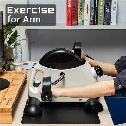 Teal Simba mini exercise bike for hands and feet, portable home use, compact equipment and accessories for fitness training.