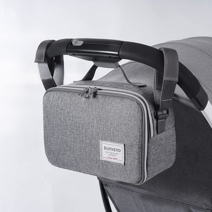 Maroon Chronos all-in-one diaper bag with changing pad, featuring multiple compartments and a sleek design for parents.